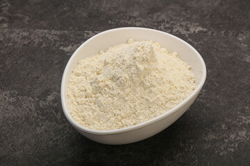Wheat flour heap in the bowl