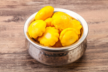 Marinated patissons in the bowl