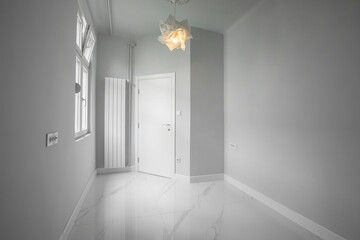 Marble floor in an empty apartment corridor