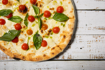 Close up of a cherry tomato pizza margherita