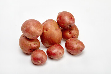 Red potatoes on a white background.