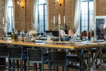 Interior of a modern restaurant with brick wall