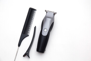 Top view of hair clipper and tools isolated on white.Barber concept