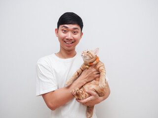 Asian man white shirt happy smile and cheerful carry orange cat look at camera on white background