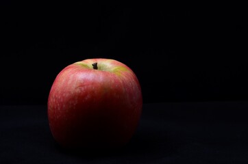 Photo of a red apple in studio