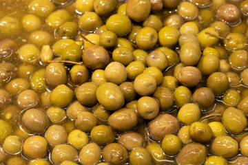 Close-up green olives. Food background