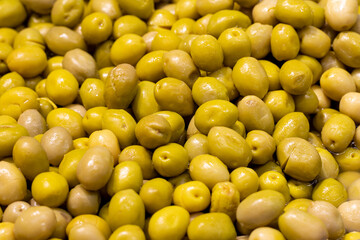 Close-up green olives. Food background