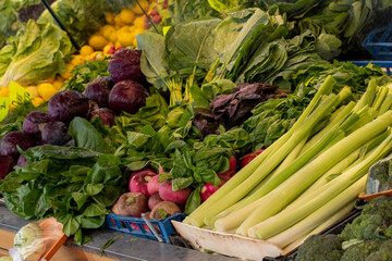 Varieties of vegetables for sale at the greengrocer stall. Food background