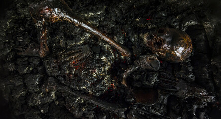 Realistic special effects makeup burn bones and skull rotate close-up props.