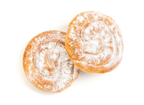 Two Spanish Ensaimada spiral pastry Isolated on white background.