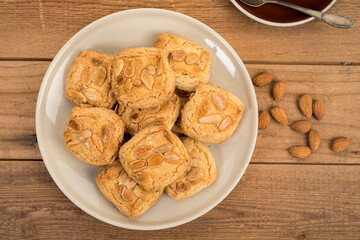 Spanish Almendrados cookies on a plate, top view