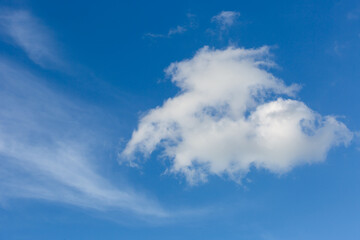 Naklejka na ściany i meble summer clouds in blue sky