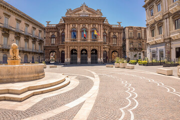 Fototapeta na wymiar CATANIA, ITALY - May 30, 2021/ Theater and fountain on Piazza Vincenzo Bellini in Catania, Sicily, Italy. Teatro Massimo Bellini, the most important theater