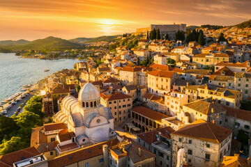 Beautiful old city of Sibenik, aerial view of the town center at sunset. Croatia.