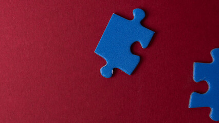 scattered puzzle pieces on colored background
