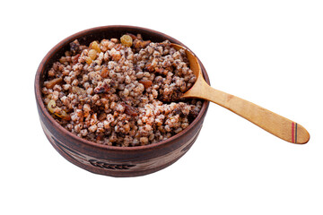 Wheat bowl isolated on white background. Sweet wheat porridge with raisins, poppy seeds and nuts is a traditional Christian Christmas meal. A plate of Kutya with a wooden false. Wheat kutia