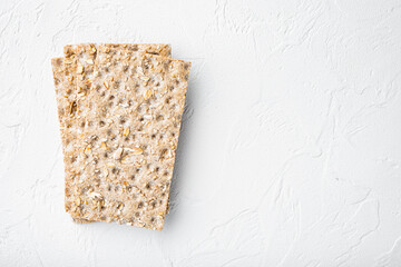 Buckwheat crisp bread, on white stone table background, top view flat lay, with copy space for text