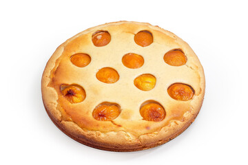 Baked homemade plum pie on a white background