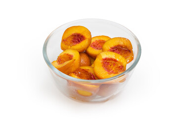 Halves of yellow plums prepared for plum pie baking