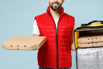 Delivery employee man in red cap white T-shirt vest uniform work dealer courier hold yellow thermal...