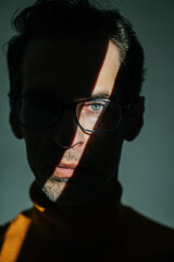 Studio shot of a serious handsome man