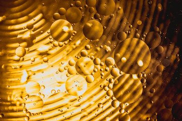 Colorful oil drops in water abstract background