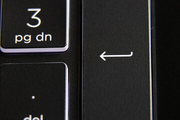 backlit gaming laptop keyboard as background