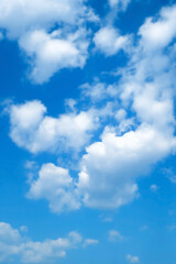 Fototapeta na wymiar 空の風景(青空) 雲が青空に高く登り立つ