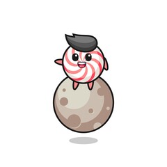 illustration of candy cartoon sitting on the moon