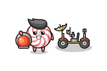 the cute candy as astronaut with a lunar rover