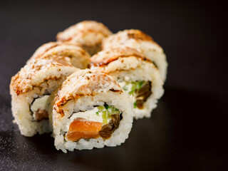 Uramaki Sushi Roll with salmon fish, avocado and cream cheese philadelphia