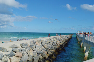 Tourists gather at Miami South Beach pier, Florida, USA