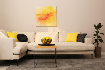 Stylish living room interior with modern comfortable sofa