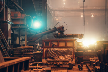 Heavy industry background. Metallurgical production. Factory machinery tools and workers.