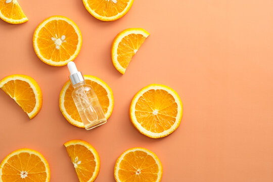 Vitamin c serum extract with sliced orange top view. Natural skin care  cosmetics. Stock Photo | Adobe Stock
