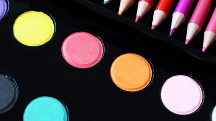 Watercolors and colored pencils