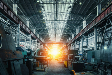 Abstract Industrial interior with light in end of workshop corridor. Metalworking factory. Machine...