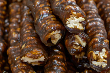 Walnut sausage. close up. Walnut Sausage as background texture
