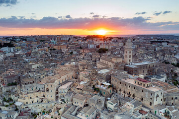 Fototapeta na wymiar Aerial view of Matera at sunset, the city of stones, in Basilicata. a landscape very beautiful