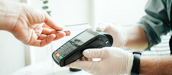 Safety wireless payment using credit card and bank terminal. Coffee small business