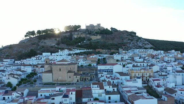 AERIAL - Sunrise at the town of Espera, Cadiz, Spain, wide shot forward