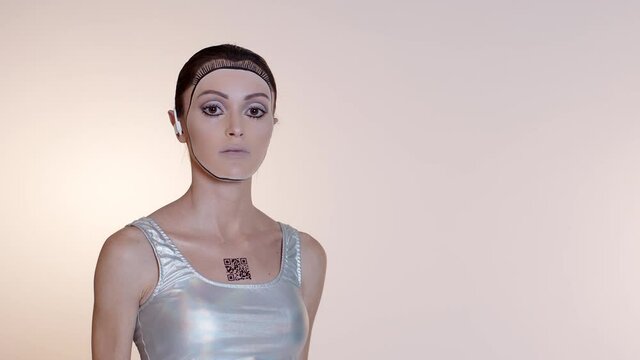 Beautiful female humanoid looking at camera