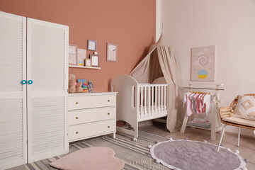 Baby room interior with stylish furniture and comfortable crib © New Africa