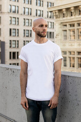 Casual white t-shirt man in the city apparel shoot