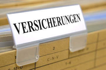 Aktenordner markiert mit Versicherungen