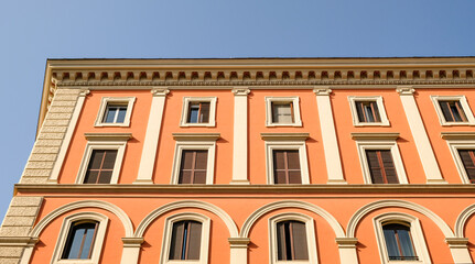 Fototapeta na wymiar Rome. Near the Vatican city, a building facade full of simetry.