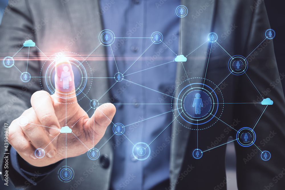 Aufkleber businessman hand using creative glowing business interface on blurry background. human resources and