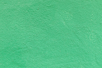 Green texture of old wall or cement surface. Backgrounds and patterns. Construction concept