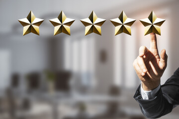 Customer experience and service rating concept with businessman touching digital five golden star...