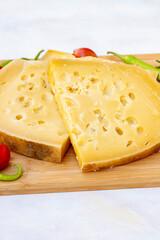 Gruyere cheese. Piece of aged Comte or Gruyere de Comte. Traditional Turkish gruyere cheese